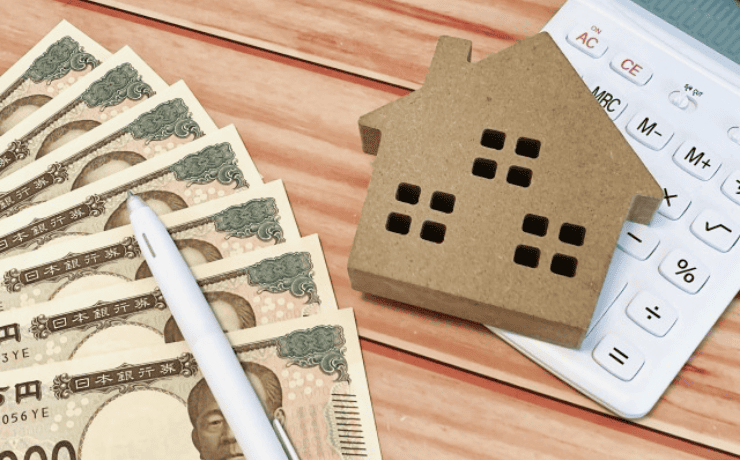 6枚の1万円札と電卓